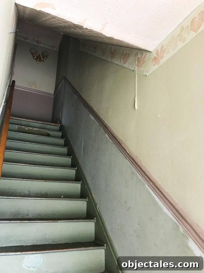 Left side living room with staircase