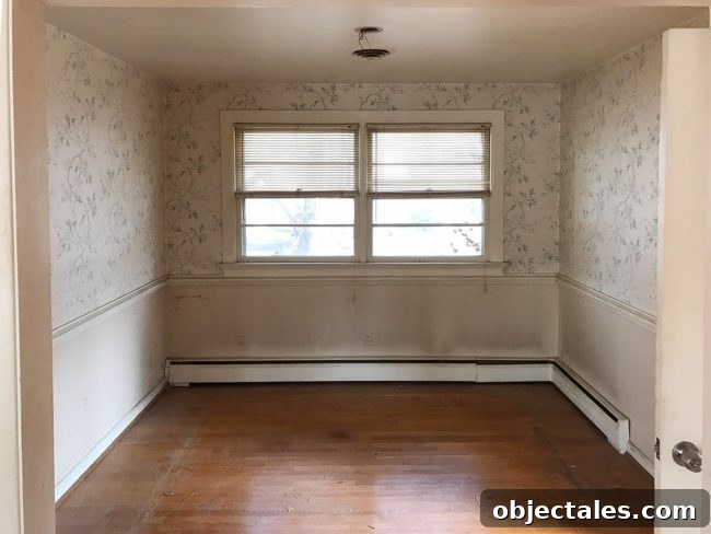 Turn Your House Into a Rental: Renovation Checklist 6 Dining room with indigo accent wall and mirror