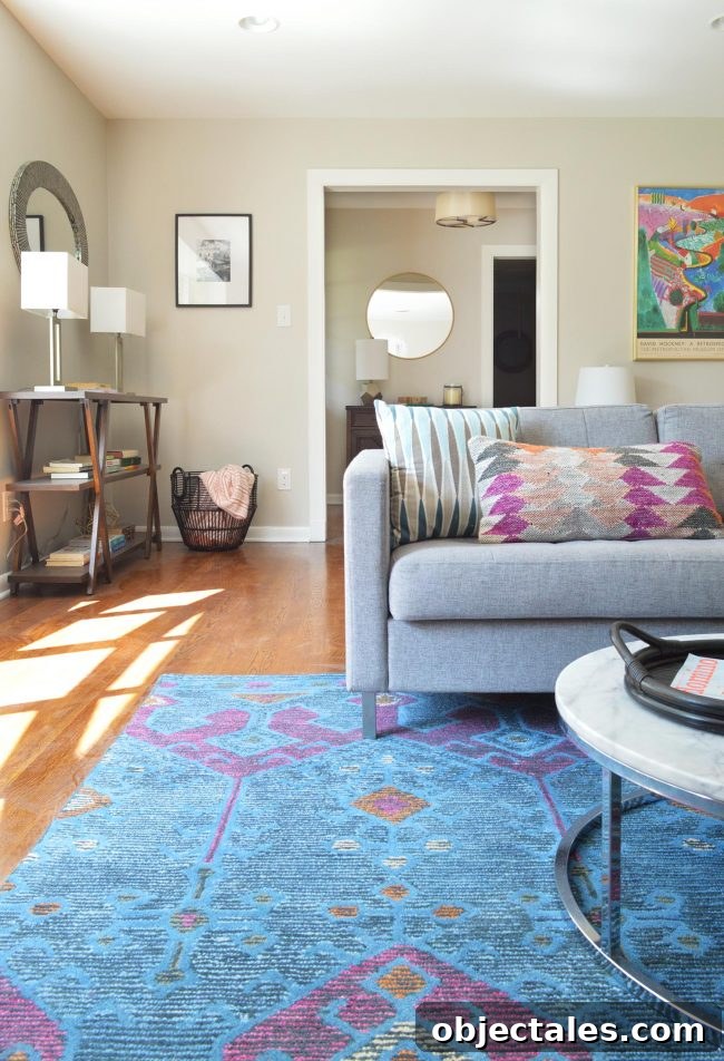 Turn Your House Into a Rental: Renovation Checklist 3 Foyer with black door and pendant light