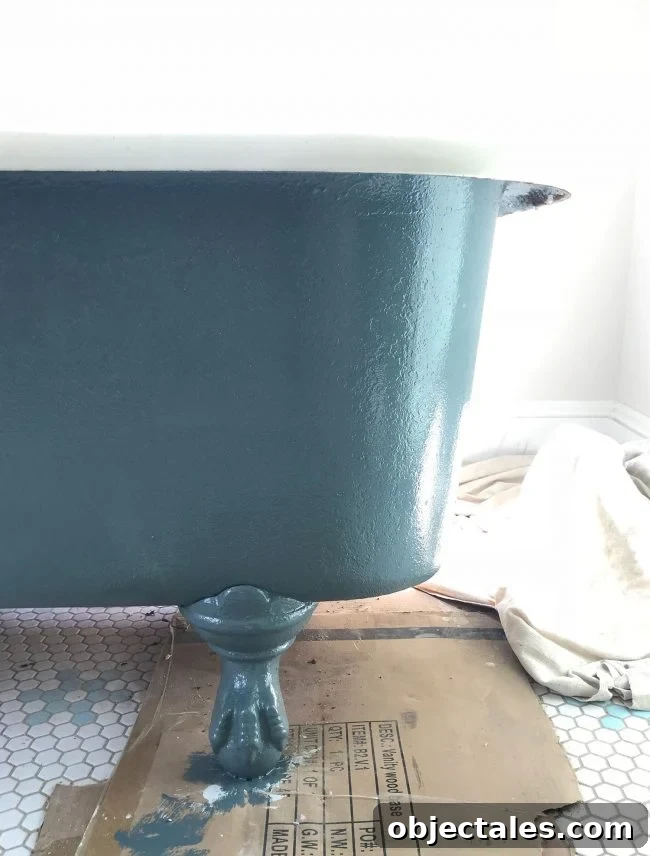 Refinish Your Old Clawfoot Tub: Step-by-Step Guide 15 Navy blue painted refinished clawfoot tub