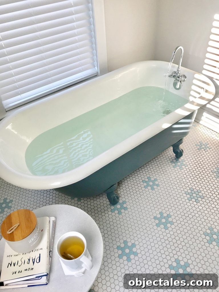 Refinish Your Old Clawfoot Tub: Step-by-Step Guide 17 Refinished clawfoot tub full of water