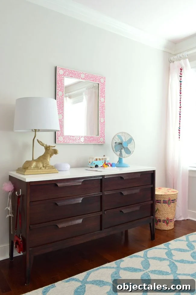 girls bedroom midcentury dresser pink mirror