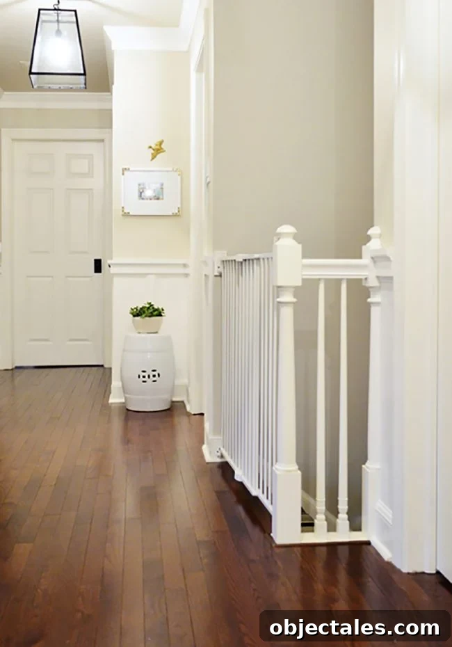 Why We Chose Not to Childproof Our Home 3 baby gate at top of stairs