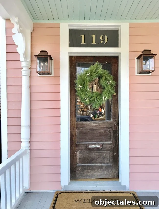 Front entry of beach house with wreath and candles