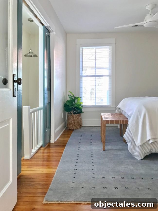 Back bedroom with clawfoot tub nearby