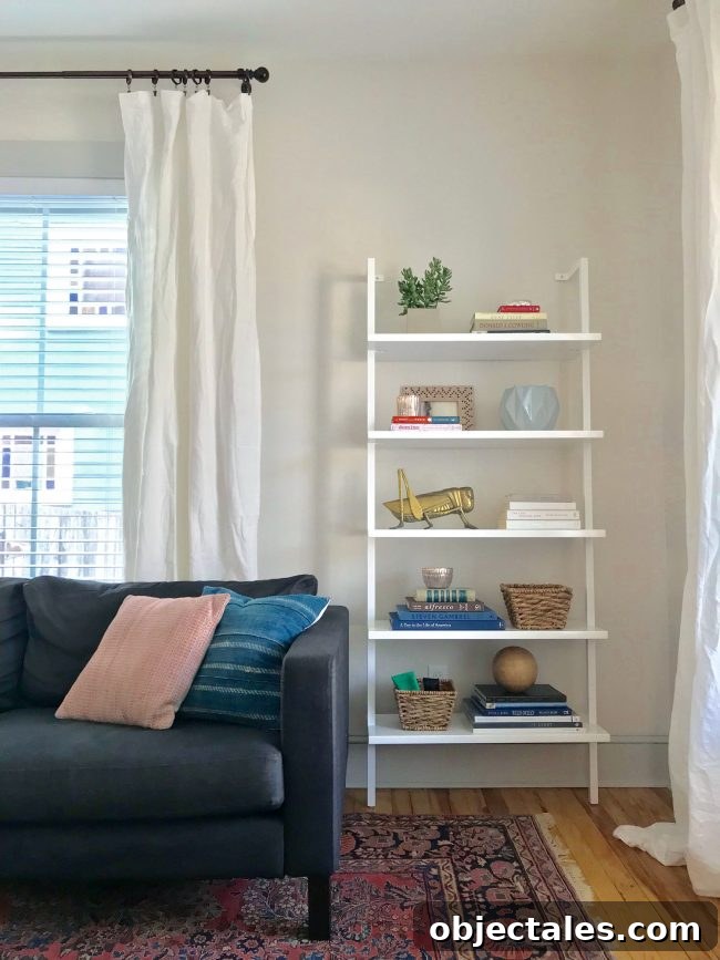 Cozy living room details with rug and chandelier