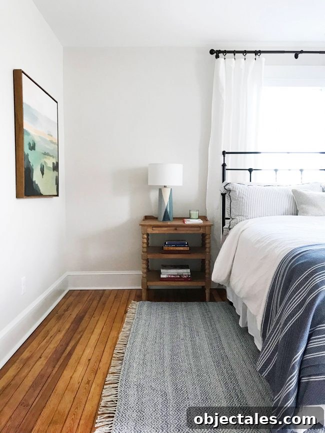 Fix Cracked or Broken Inlay Furniture: Step-by-Step Repair 11 metal headboard in beachy blue bedroom with pine floors