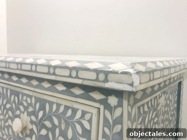 Fix Cracked or Broken Inlay Furniture: Step-by-Step Repair 6 spackle fill to repair inlay tile that is missing or broken