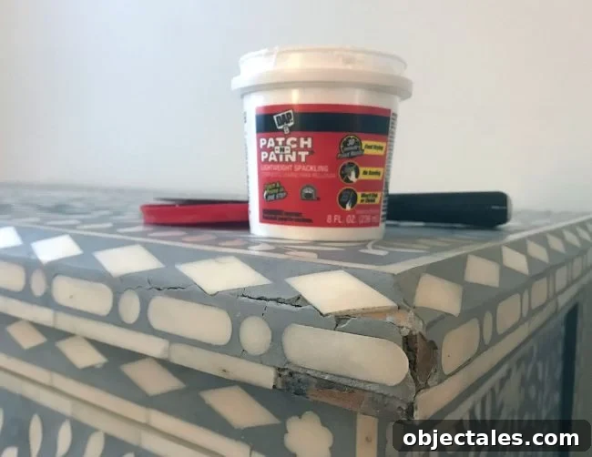 Fix Cracked or Broken Inlay Furniture: Step-by-Step Repair 9 before photo of cracked and broken inlay tile