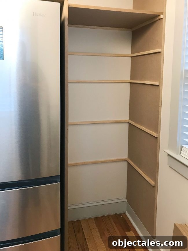 thin brace pieces added where pantry shelves will rest