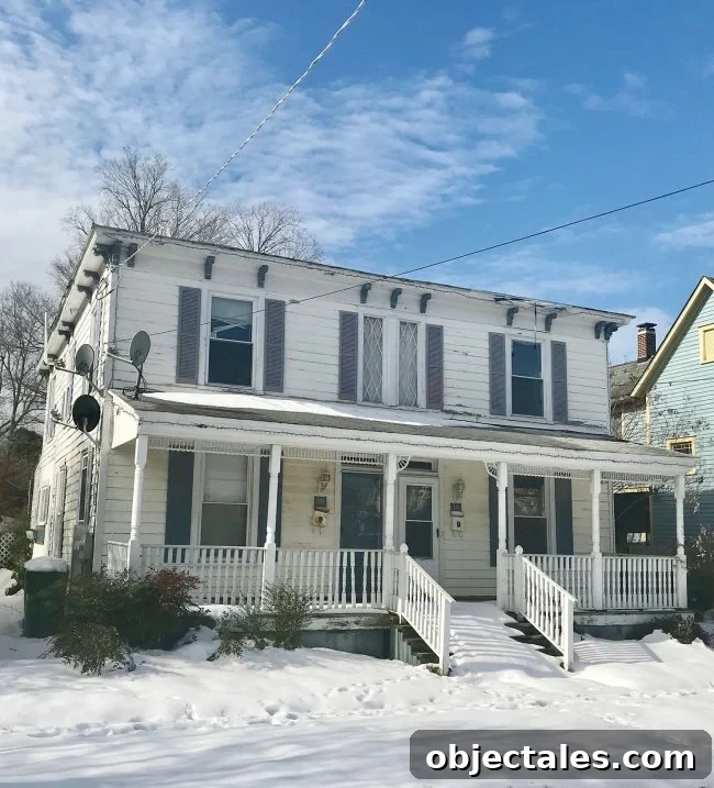 Before photo of historic home in Cape Charles Virginia in snow