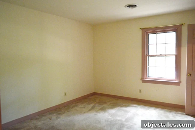 Before photo of child's bedroom with old carpet