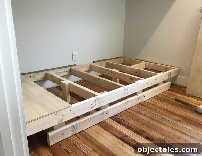 How to Build Built-In Bunk Beds: Step-by-Step Guide 9 bottom bunk reconstructed to float off of the floor