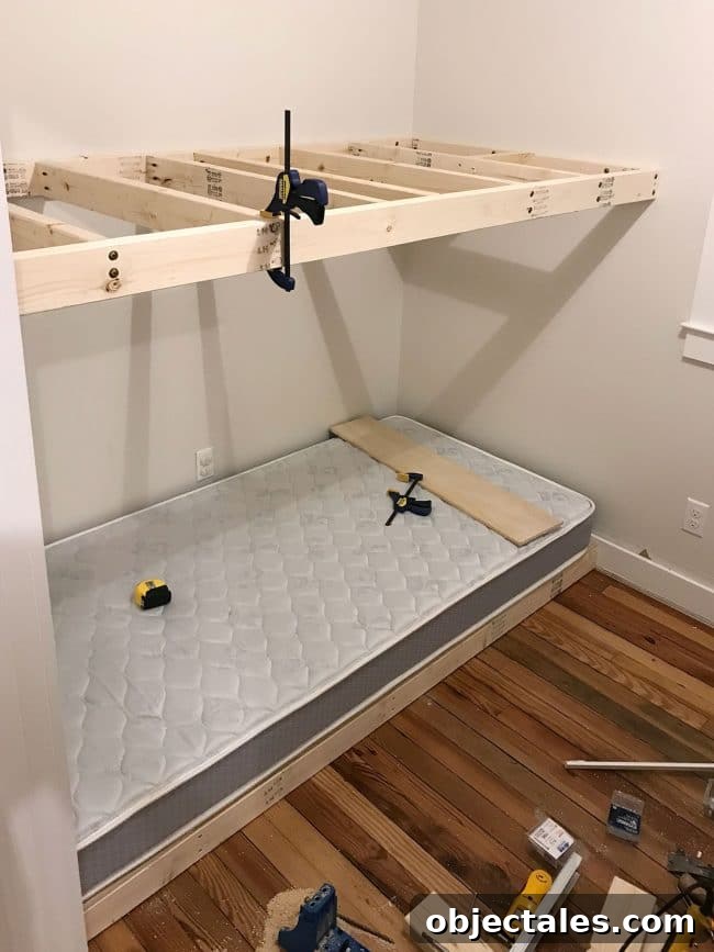 How to Build Built-In Bunk Beds: Step-by-Step Guide 13 top floating bunk added in wall to wall bunk beds