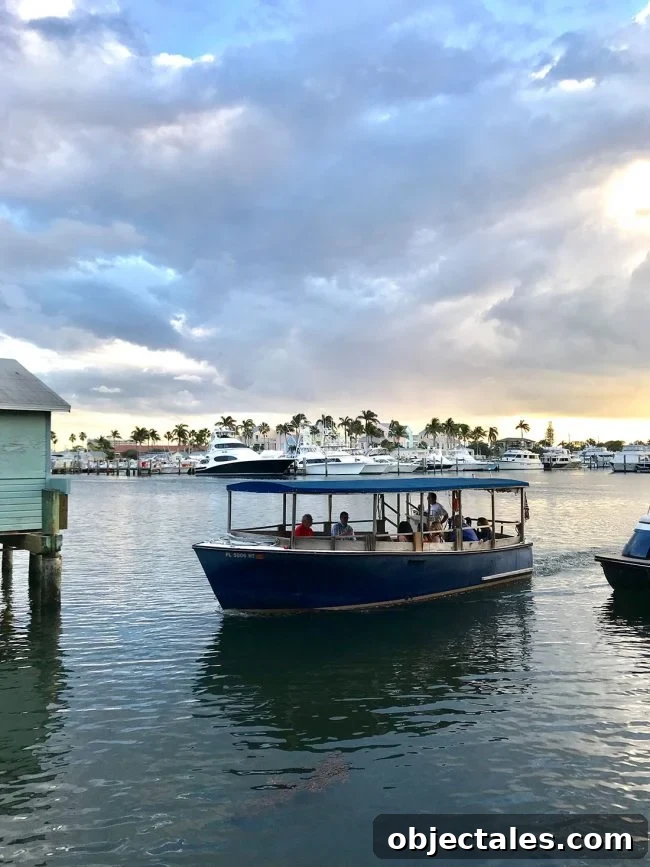 Family Spring Break in Fort Lauderdale: Top Tips & Highlights 9 small boat picking up diners for Cap's Place Restaurant in Lighthouse Point Florida