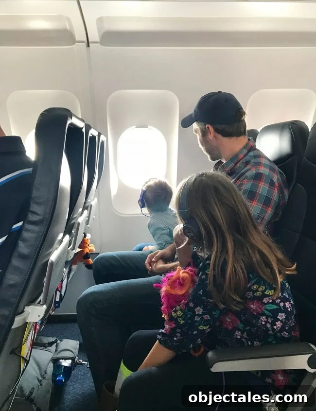 Family Spring Break in Fort Lauderdale: Top Tips & Highlights 4 John and kids on plane to spring break in florida