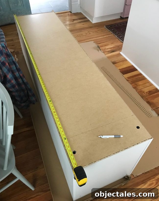 Conceal Your Water Heater with an IKEA Cabinet 7 back of ikea pax wardrobe with marks for cutting hole