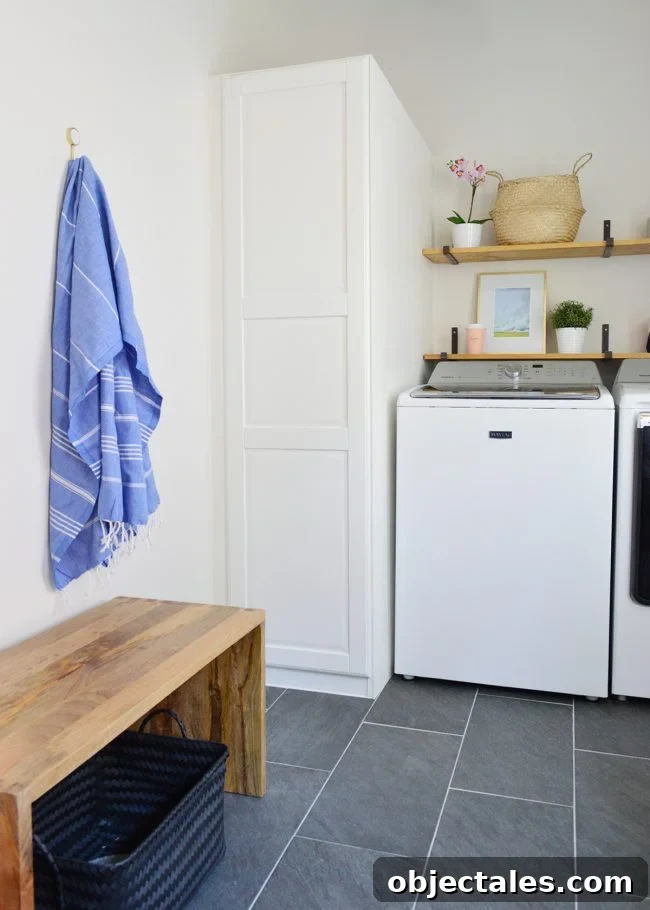 Conceal Your Water Heater with an IKEA Cabinet 12 wood bench in front of laundry room storage with towel hook