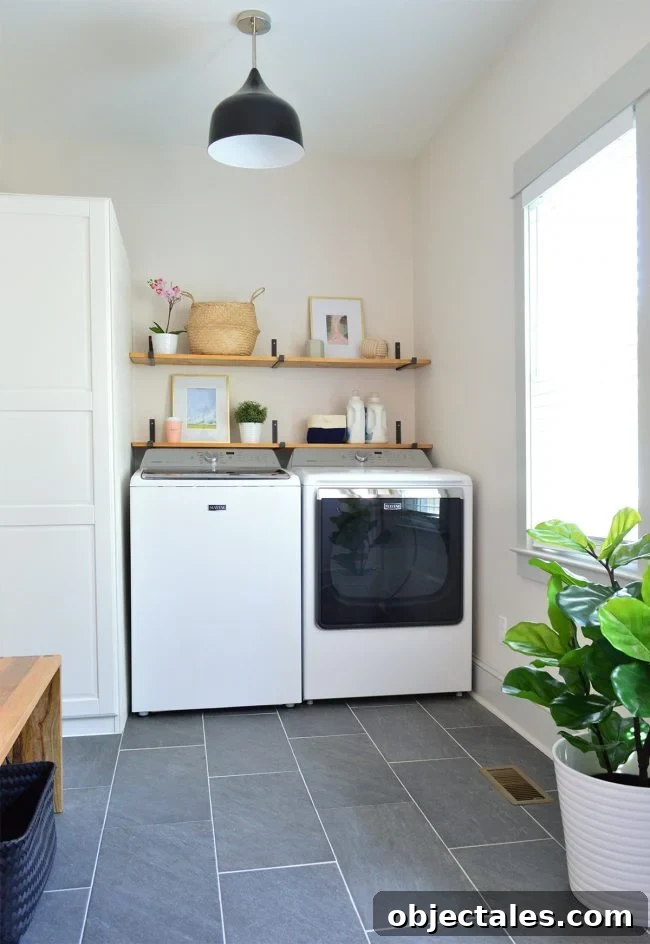 Conceal Your Water Heater with an IKEA Cabinet 13 laundry room with slate floors black light fixture open wood shelves