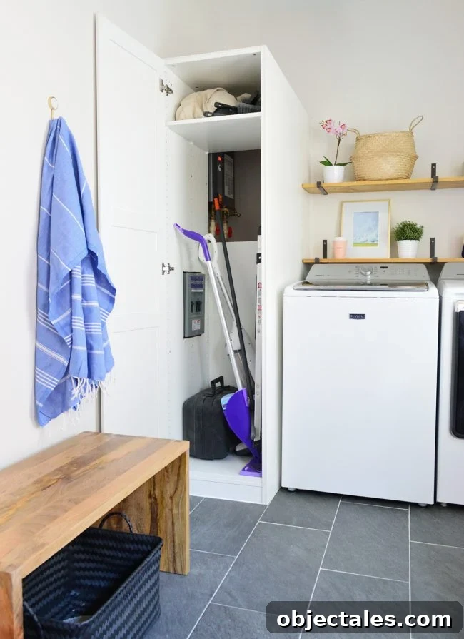 Conceal Your Water Heater with an IKEA Cabinet 6 ikea pax wardrobe used for laundry storage cabinet open with access to water heater