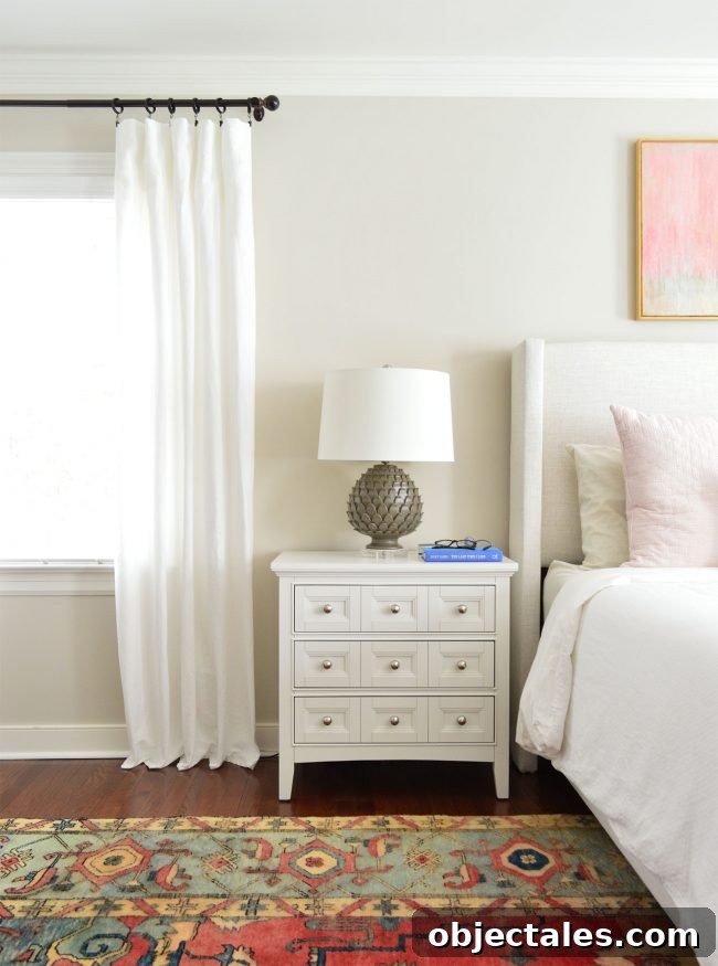 white ikea lenda curtain panels next to nightstand