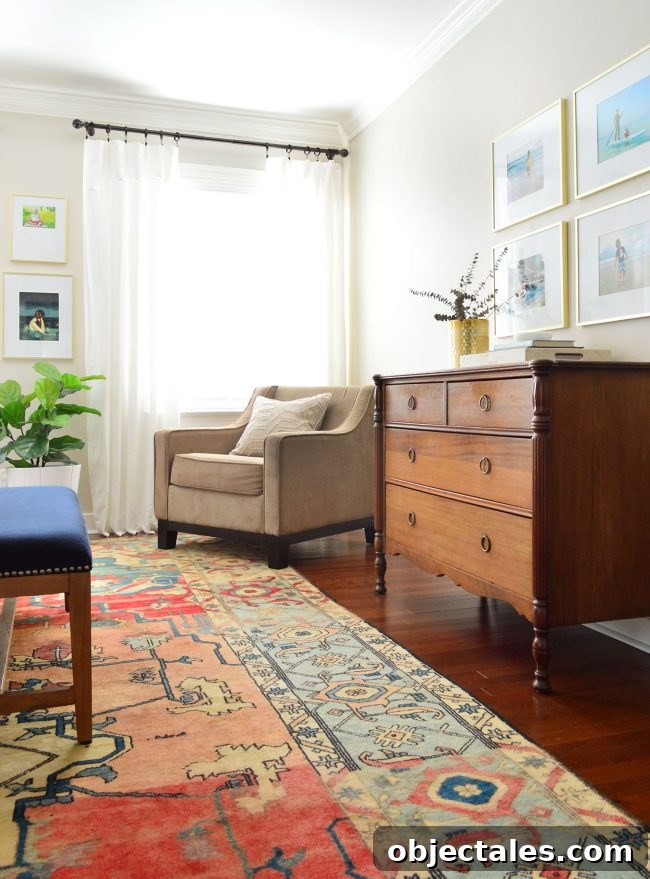 vintage dresser in master bedroom with white curtains