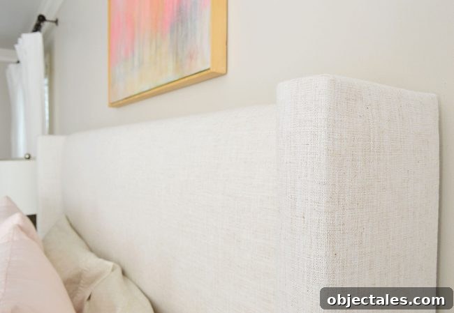 detail on upholstered bed with linen texture