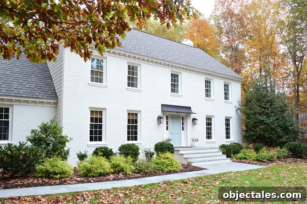 How We Painted Our Brick House White 13 White Painted Brick Home With Modern Metal Portico Cover