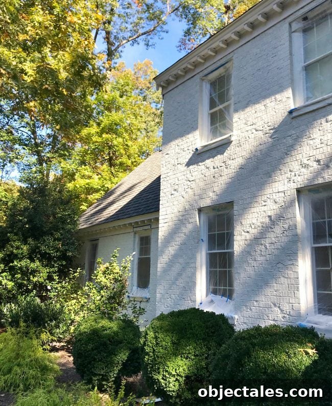 How We Painted Our Brick House White 16 after photo of brick house painted sherwin williams moderne white