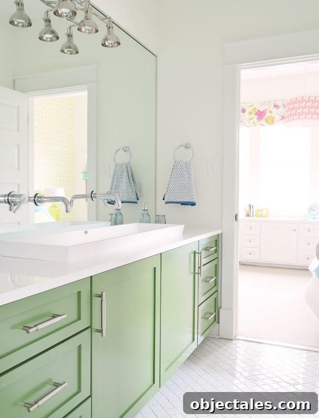 Jack-and-jill bathroom with green vanity