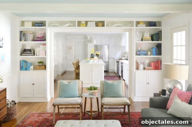 Cased opening between kitchen and living room with built-ins