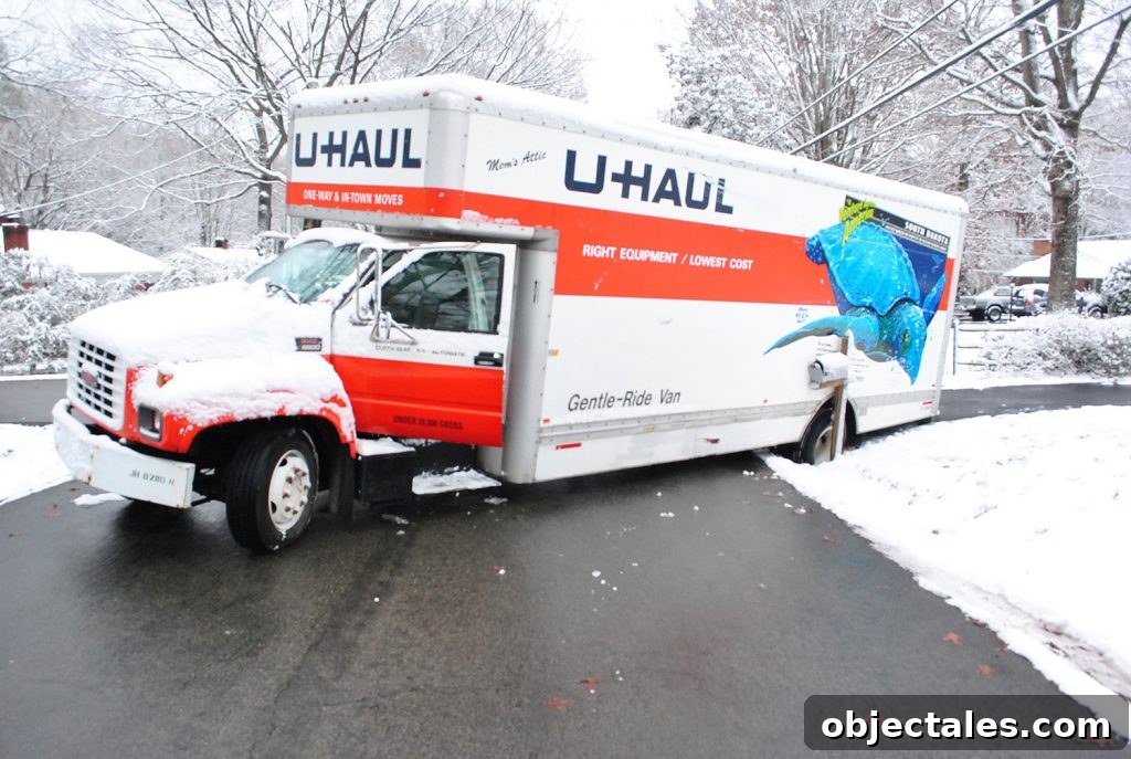 Moving truck stuck in a ditch