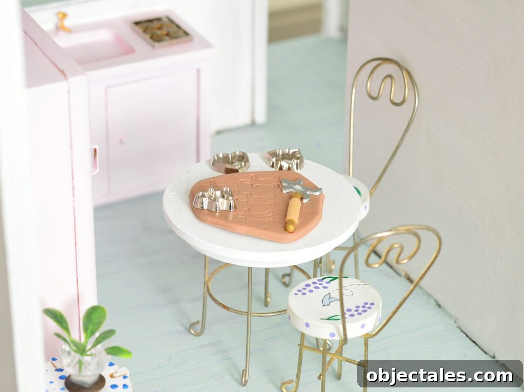 Miniature pancakes and gingerbread kit in dollhouse kitchen