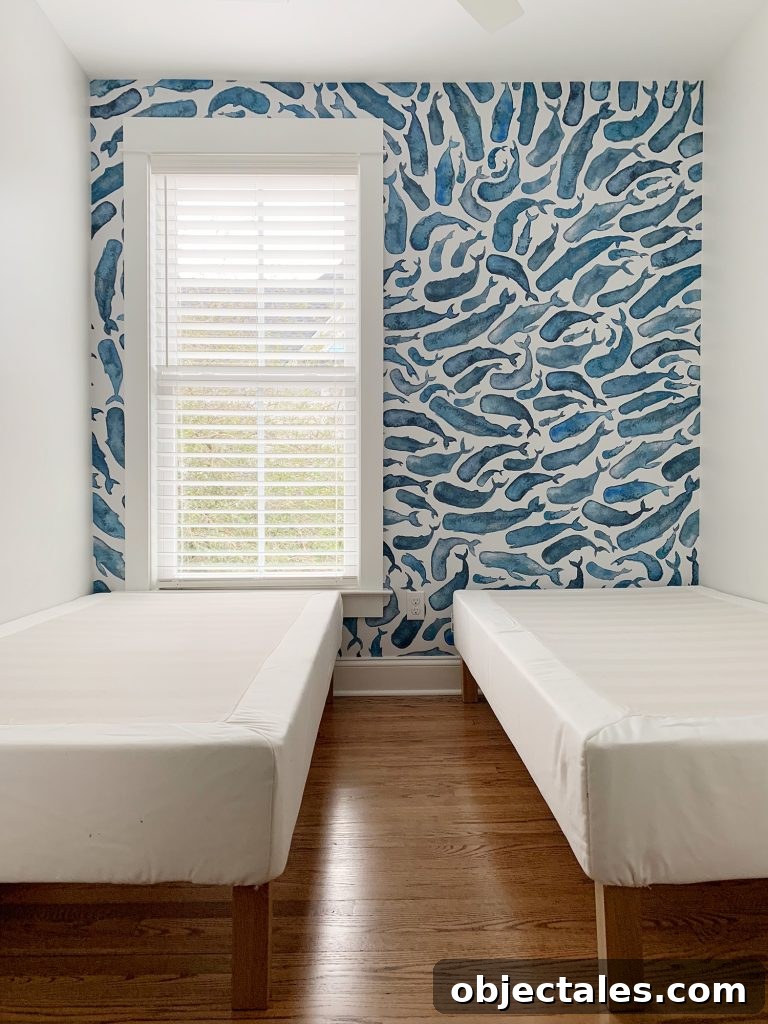 How to Install a Peel-and-Stick Wall Mural 17 Small Room With Blue Whale Peel-and-Stick Wall Mural And Two Twin Beds