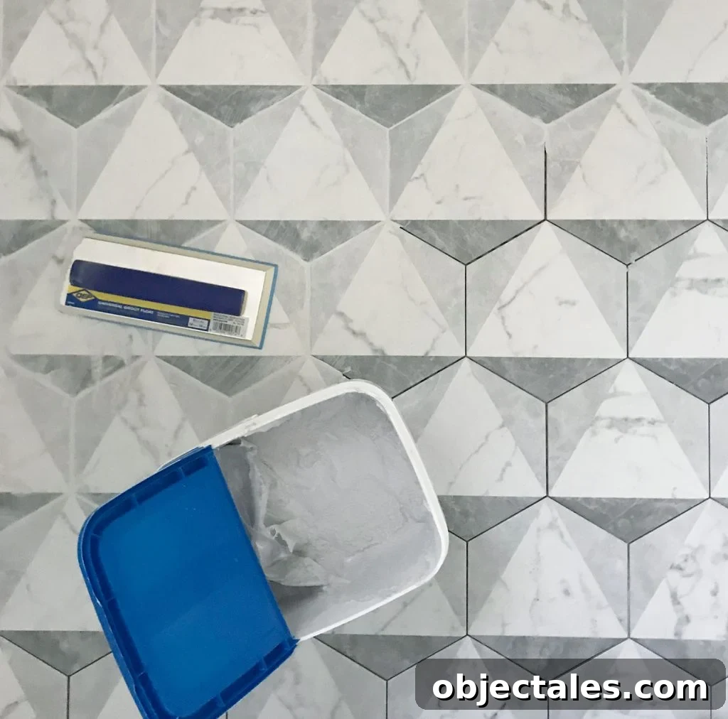 marble hex tiles getting grouted with mapei grout