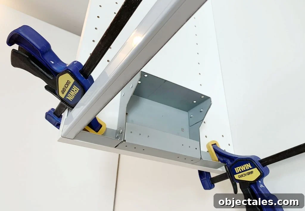 How to Install IKEA Kitchen Cabinets: Step-by-Step 17 Clamped cabinets during installation