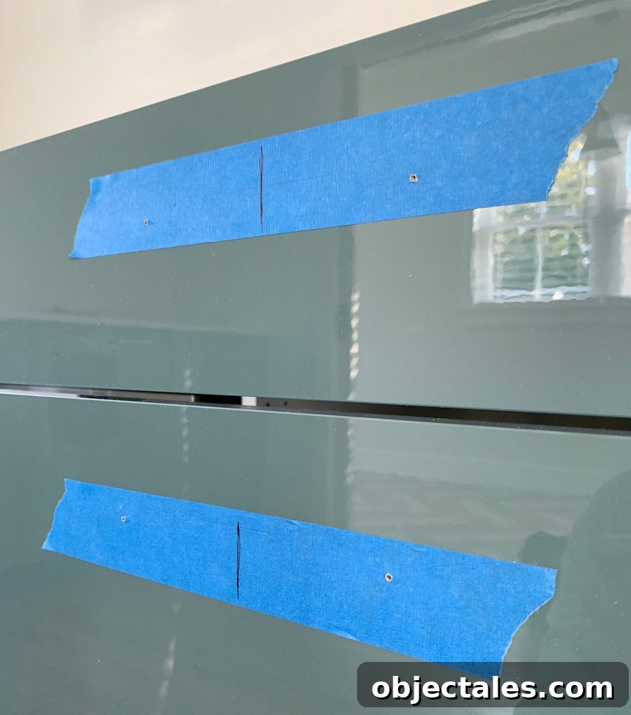 How to Install Cabinet Hardware: A Complete Guide 14 Small Pilot Holes Made In Kitchen Cabinet Drawer Front For Hardware