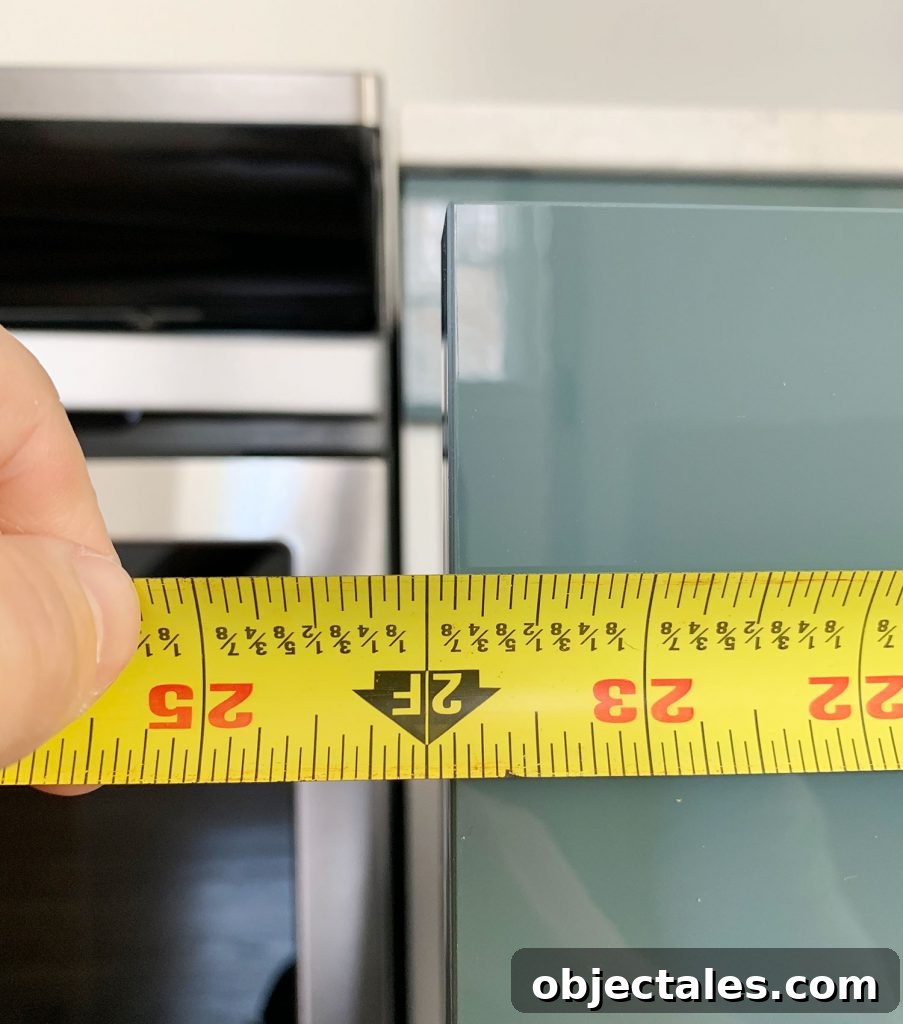 How to Install Cabinet Hardware: A Complete Guide 7 Measured Length Of Cabinet Drawer Front Using Tape Measure