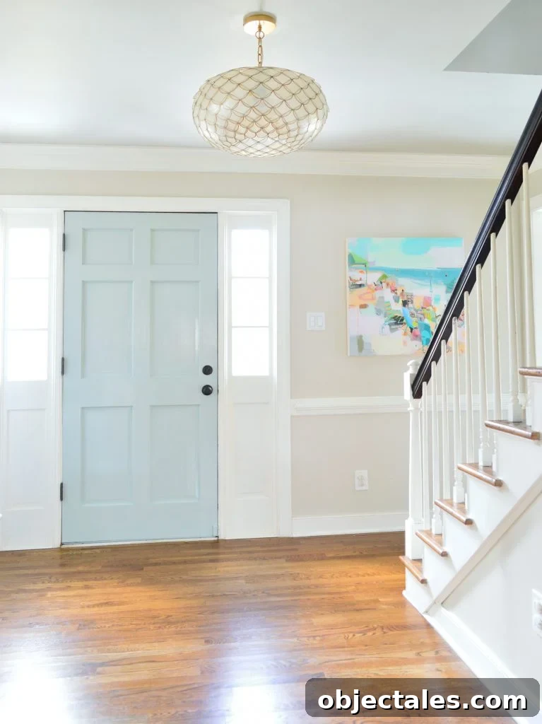 Front Door Paint Guide: Top Paint Choices and Pro Tips 4 Tranquility Benjamin Moore Glossy Paint On Front Door In Foyer