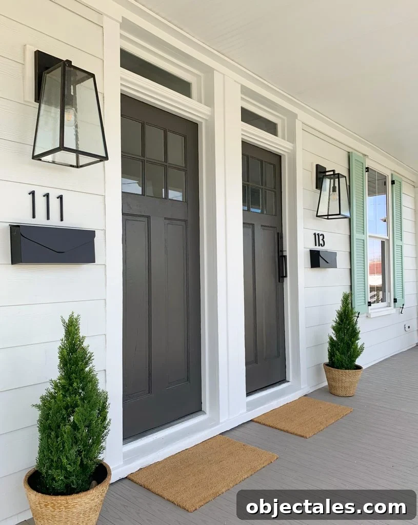 Duplex Front Porch Makeover: Stunning Before & After 2 Duplex Front Porch From Angle With Oversized Black Lanterns And Matching Mailboxes