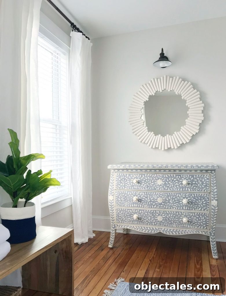 White faux wood blinds in bedroom