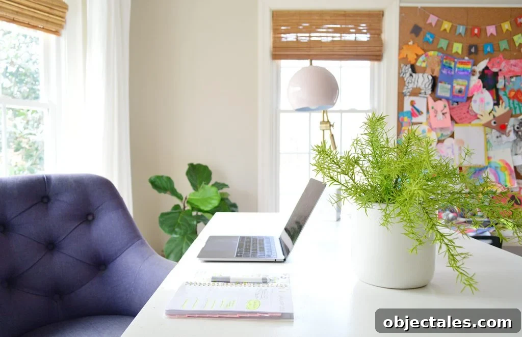 Low-Maintenance Houseplants and Lifelike Faux Alternatives 10 White home office desk with faux greenery in planter