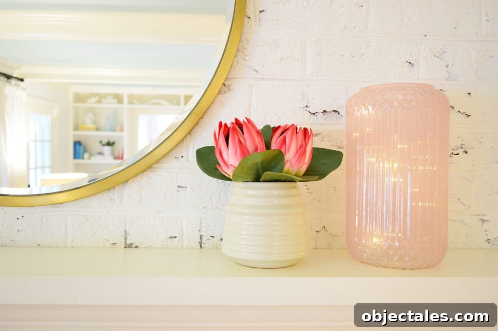 Low-Maintenance Houseplants and Lifelike Faux Alternatives 11 Faux flowers on fireplace mantle in living room