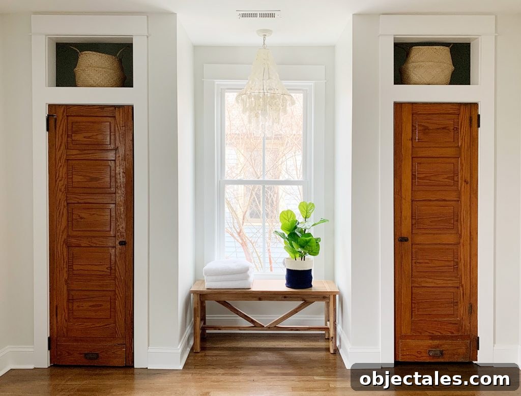 Low-Maintenance Houseplants and Lifelike Faux Alternatives 4 Faux fiddle leaf fig on bench between two closets under chandelier