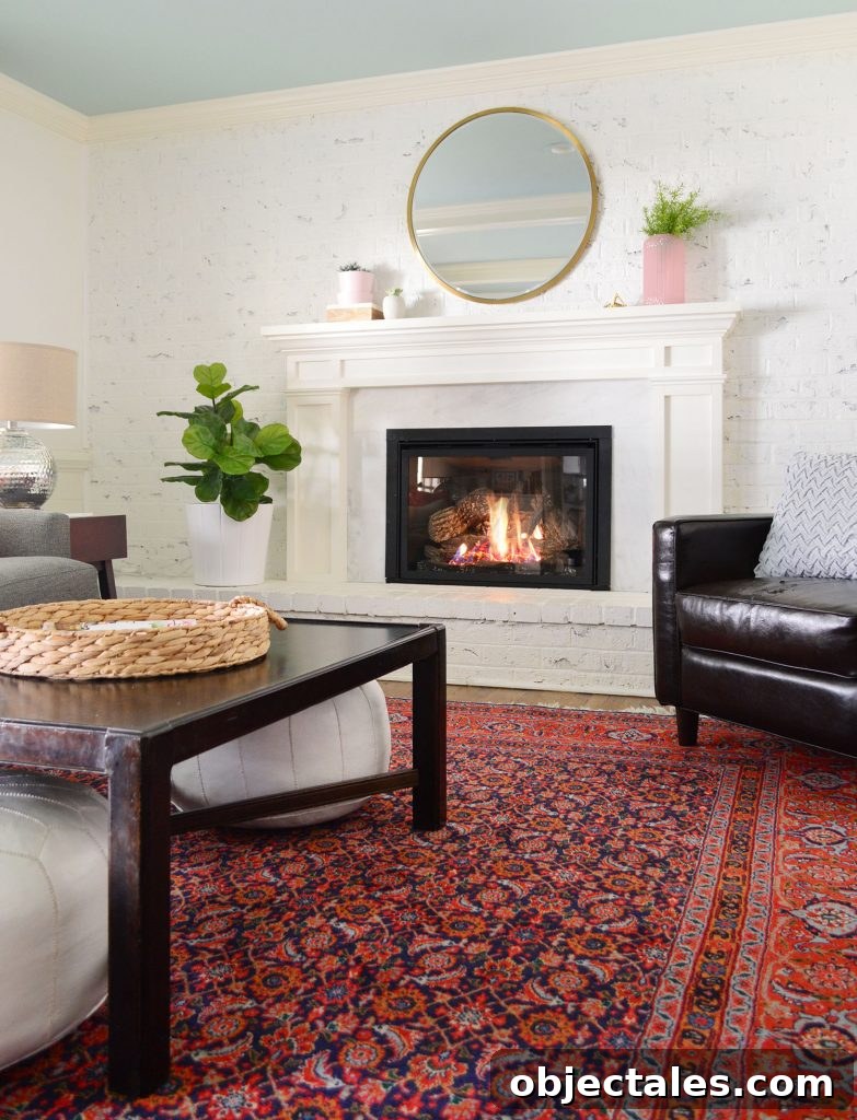 Low-Maintenance Houseplants and Lifelike Faux Alternatives 5 Faux greenery in living room with white walls and red vintage rug