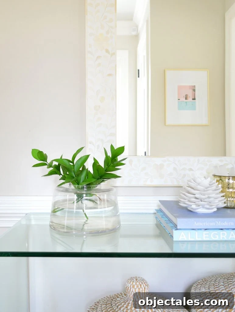 Low-Maintenance Houseplants and Lifelike Faux Alternatives 6 Yard clippings from bush in shallow vase on acrylic entry table