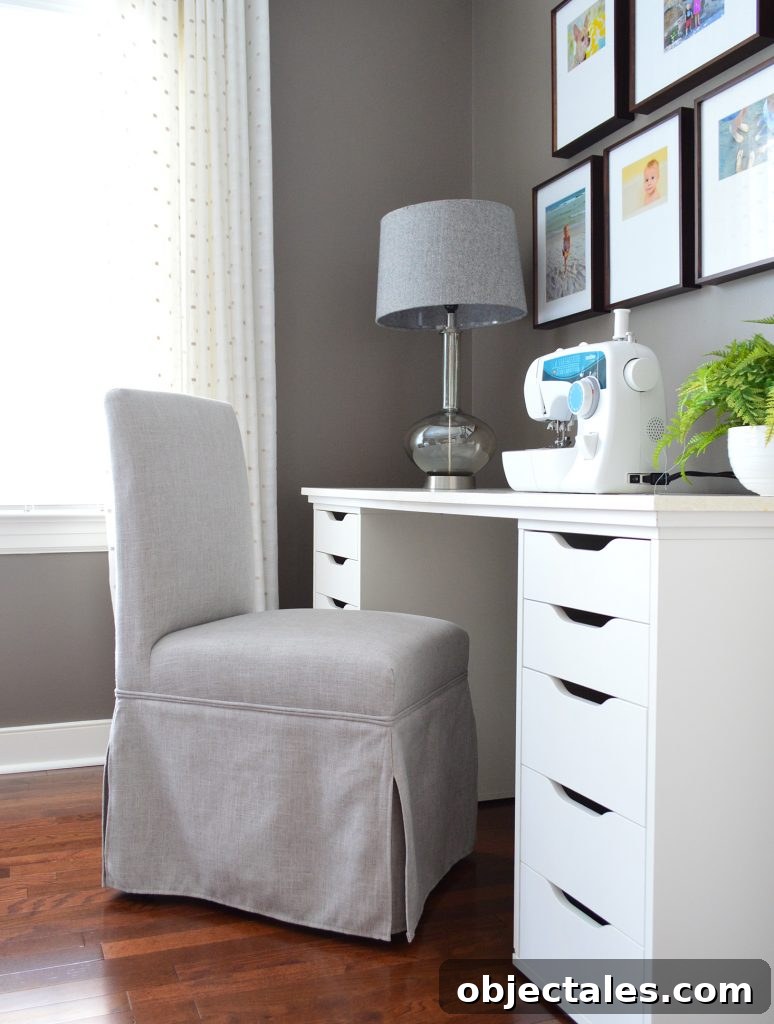 Guest room with photos above desk