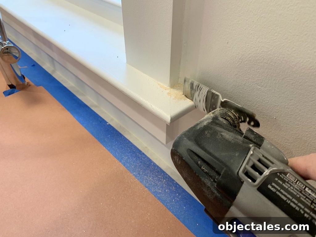 Trimming Window Molding With Dremel Before Backsplash Install