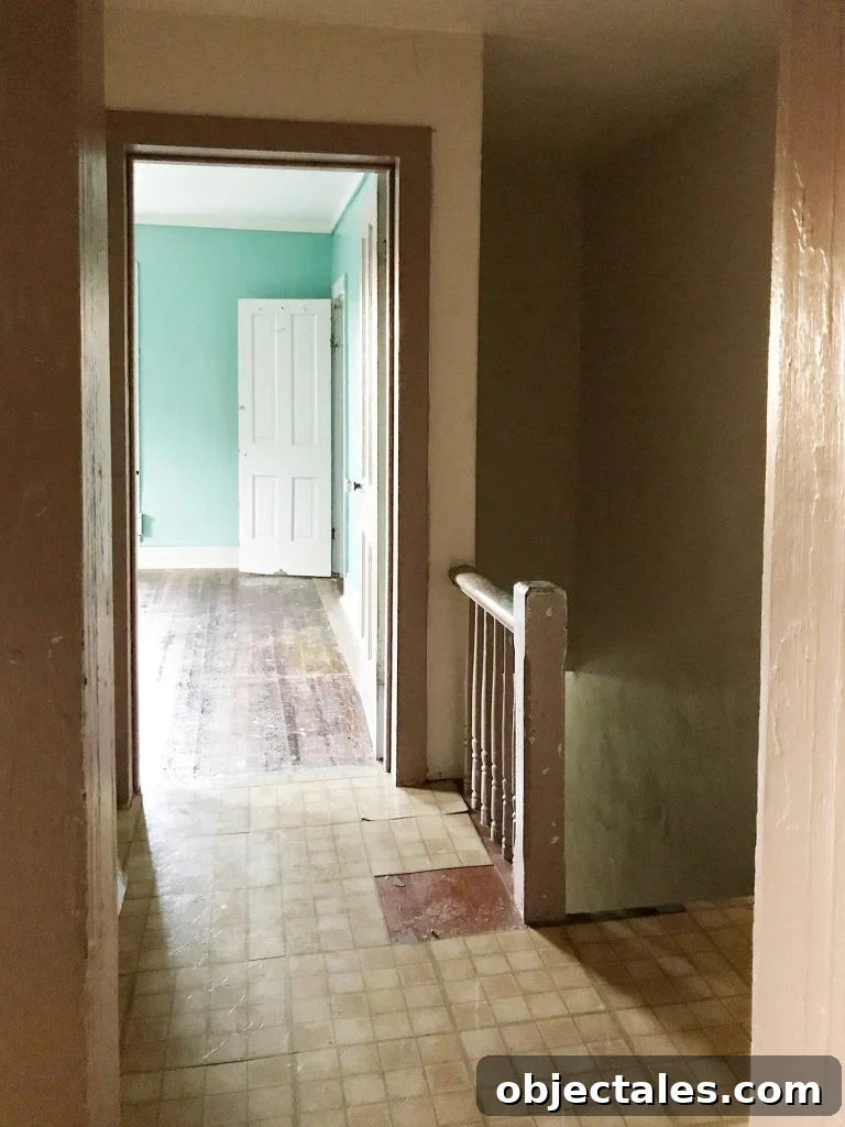 Before photo of upper hallway and stairs