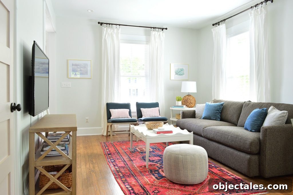 Duplex Living Room and Dining Room Transformations 10 Bright Living Room Red Rug With Blue Target Chairs Crate And Barrel Sofa